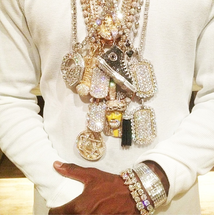 He wore all his necklaces at once.