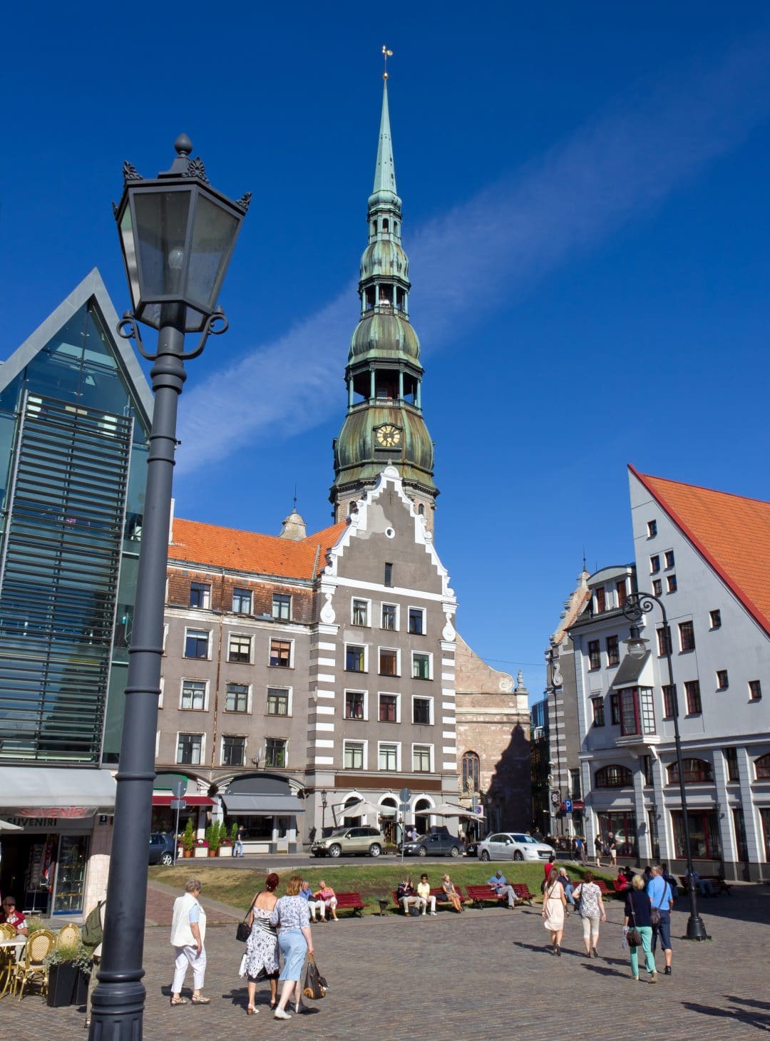 View of a part of the Town Hall square in Riga, Latvia, with the steeple of St. Peter's Church in the background